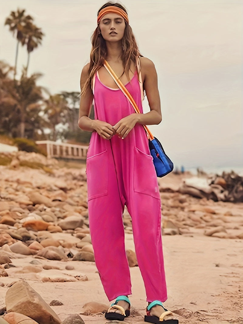 Breezy Chic Sleeveless Jumpsuit: Spaghetti Strap Romper with Pockets